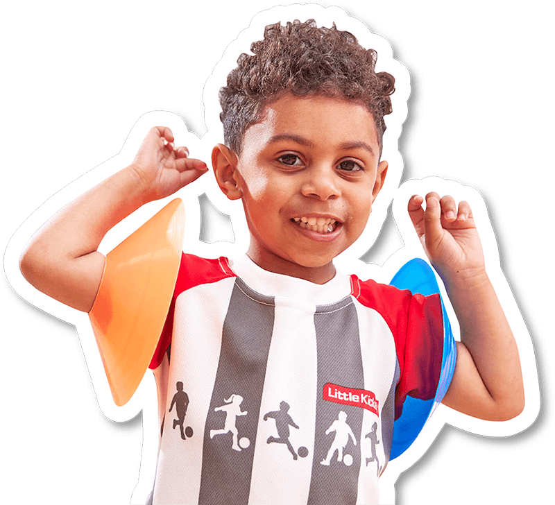 Young child playing soccer